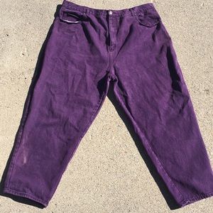 Purple plus size mom jeans with tapered legs.